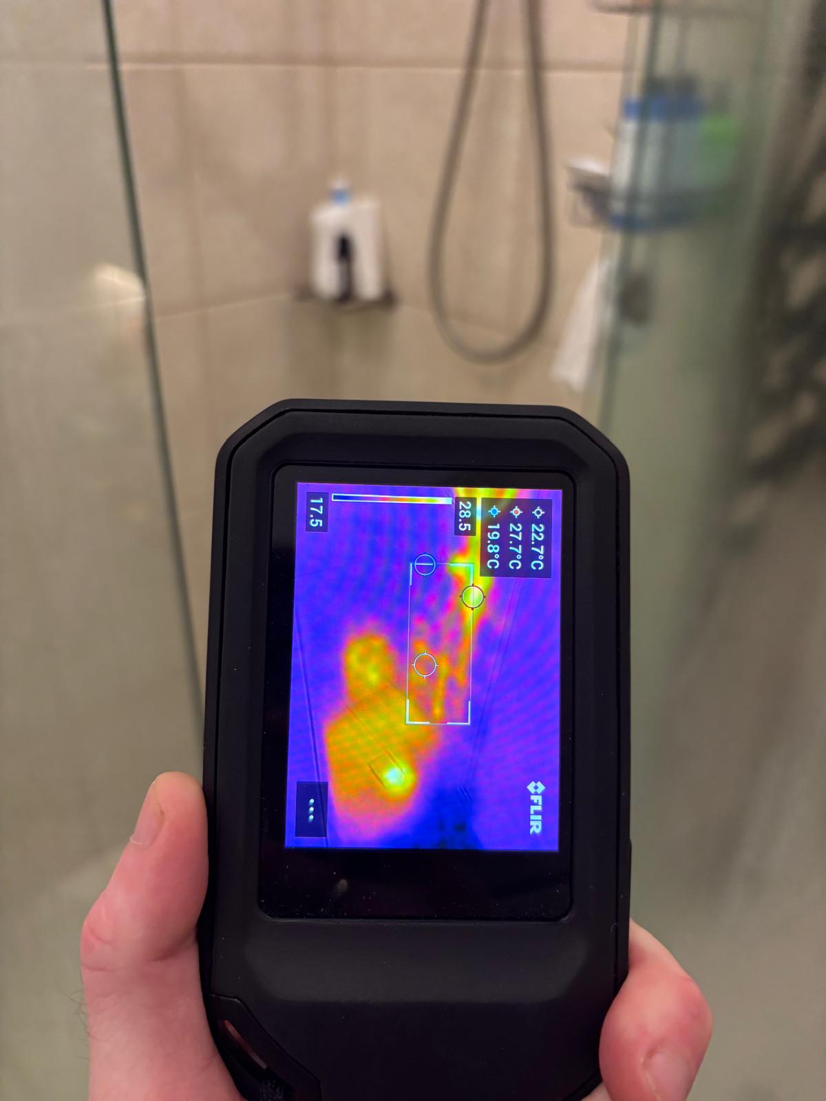 Thermal camera being used to inspect a bathroom leak